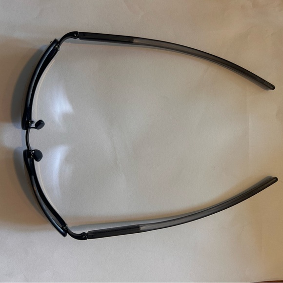 Prada Dark-Tinted Sunglasses with Black Case - Picture 5 of 9